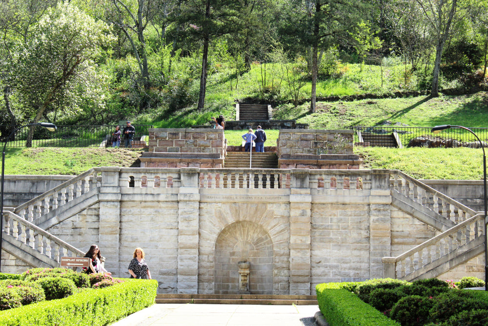 Tourists Walking Around The Formal Entrance to Balustrade in Hot Springs National Park