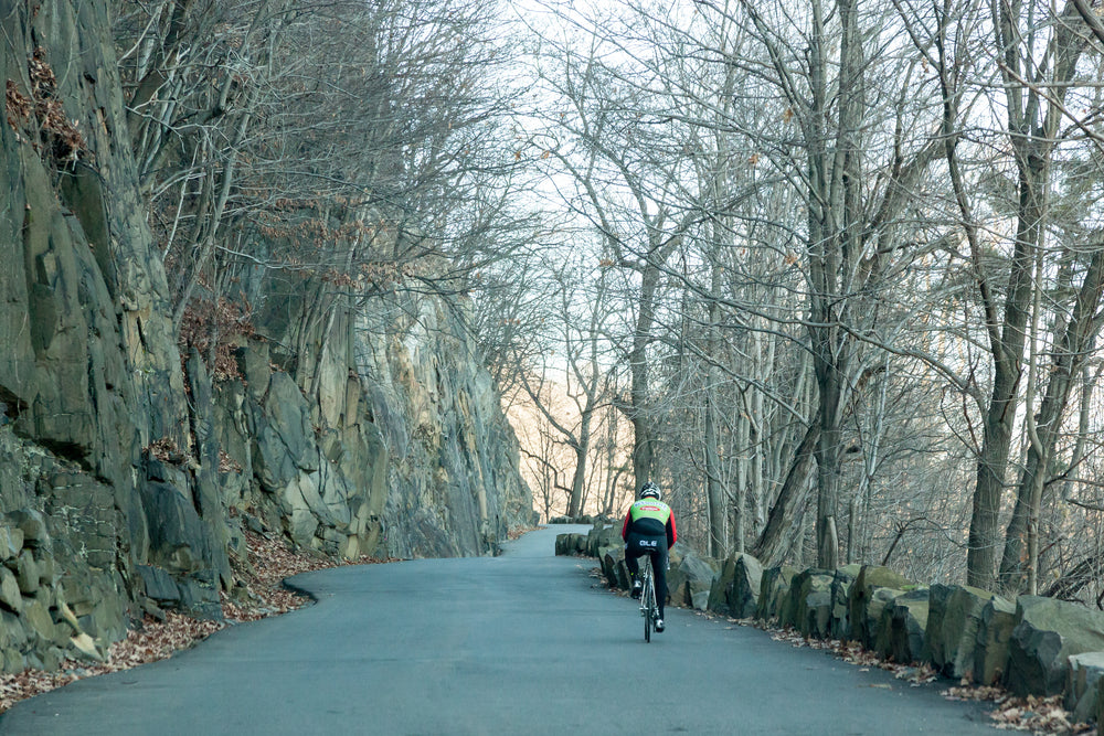 View of Cyclist Along Roadway in Palisades Interstate Park New Jersey