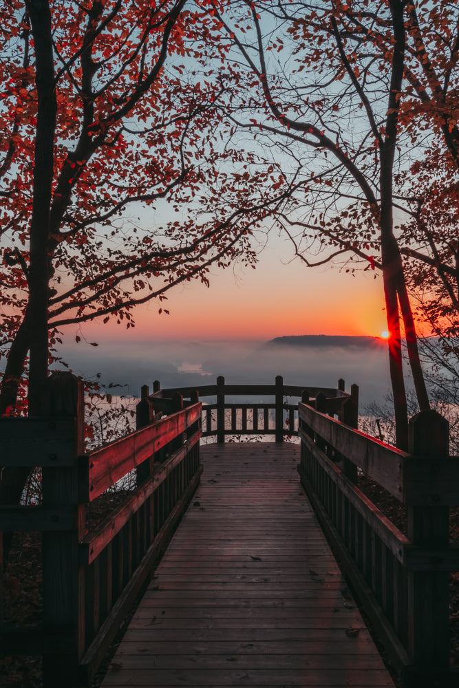 View of Foggy Sunrise on Boardwalk Over Mississippi River in Pikes Peak State Park Iowa