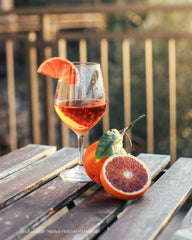 Aperol Spritz cocktail on table with orange slice