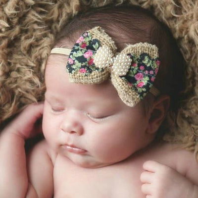 infant girl head bows