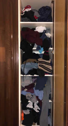 Closet chaos with clothes disorganized