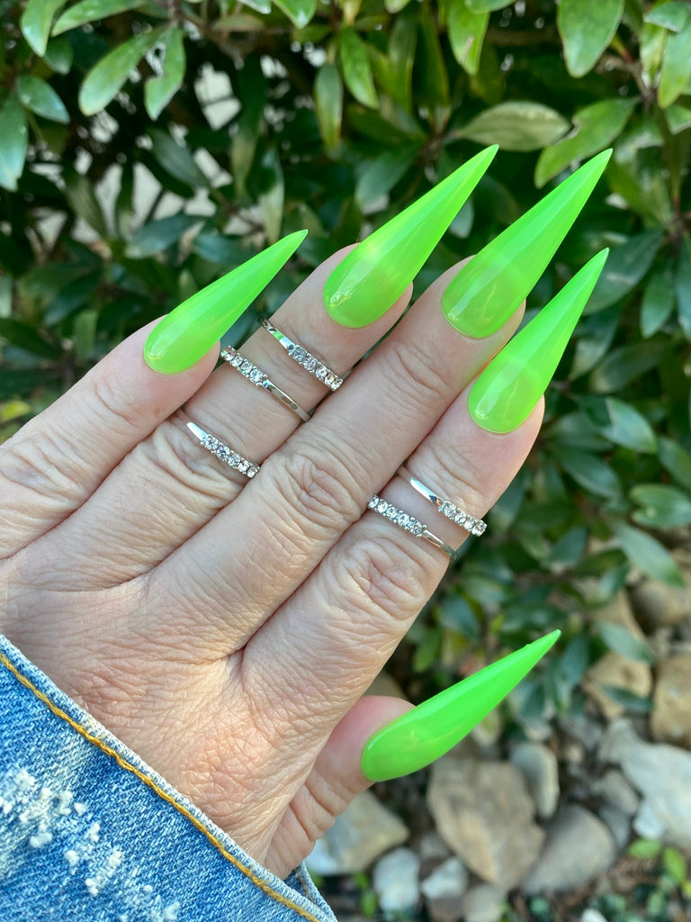 neon green stiletto nails