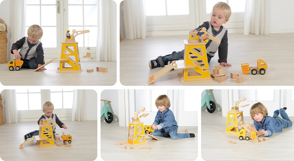 Sturdy wooden construction site featuring a tower crane with a movable working platform.  Workers will be busy controlling the crane and moving the building materials and debris.  Made of sustainable European beech and plywood.