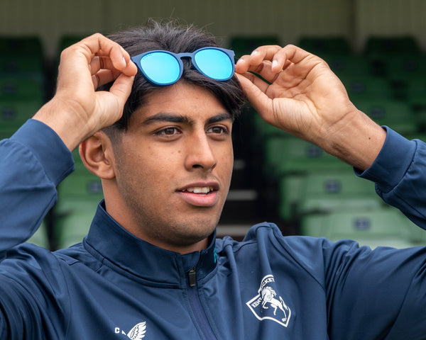 Cricket player wearing sunglasses
