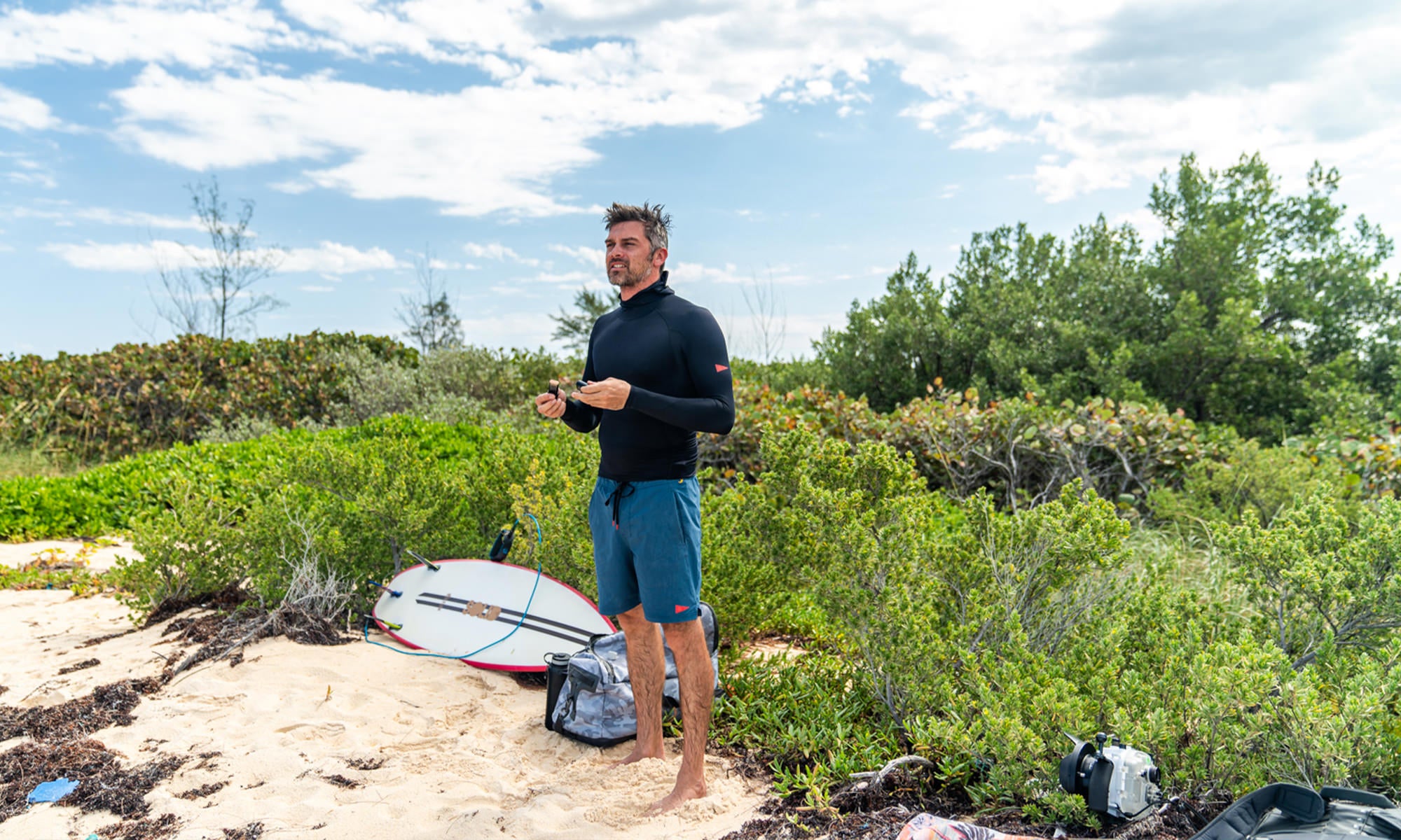 Checking the waves in the hooded rashguard