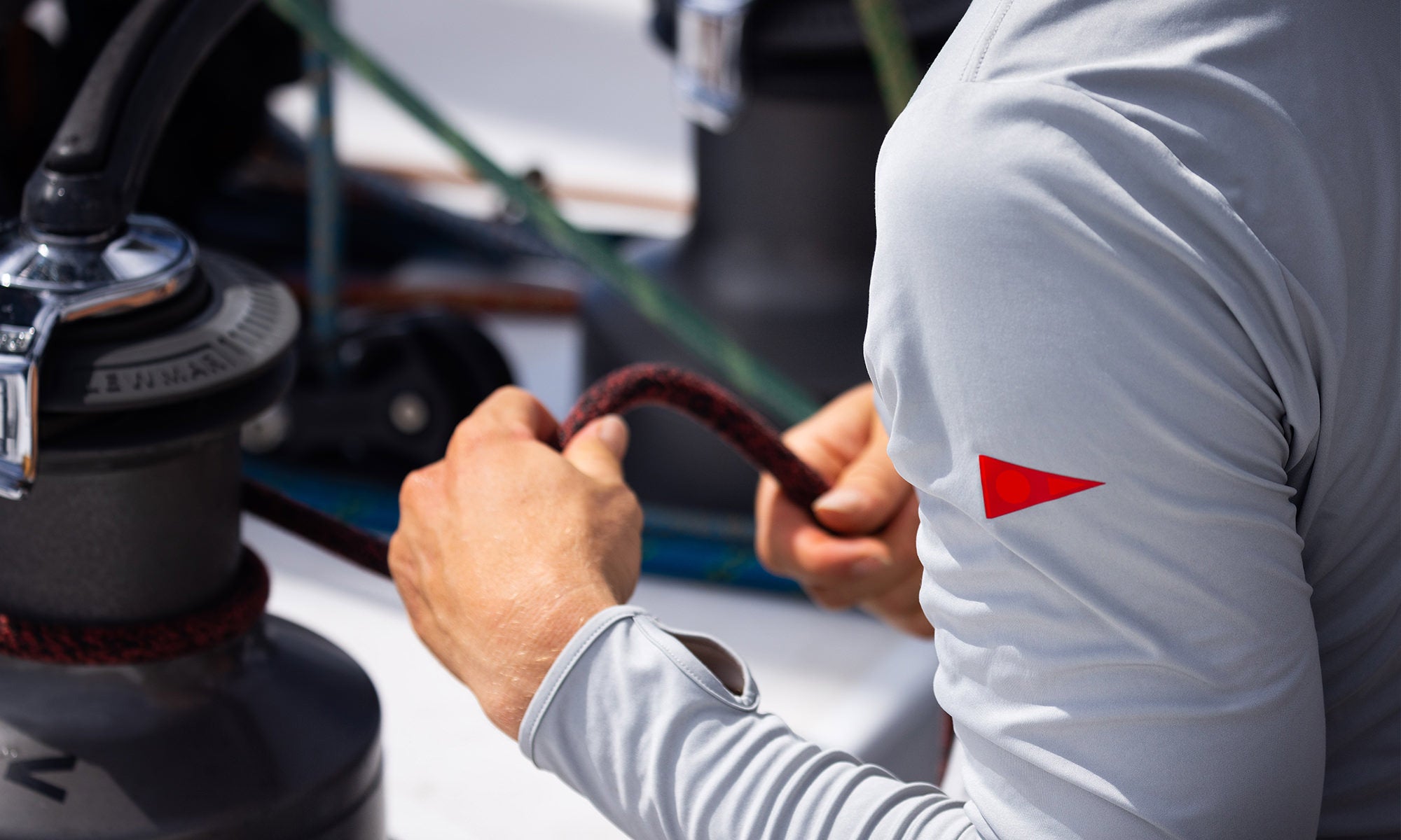 John holding a rope on a sailboat Florence UPF Sun Protection