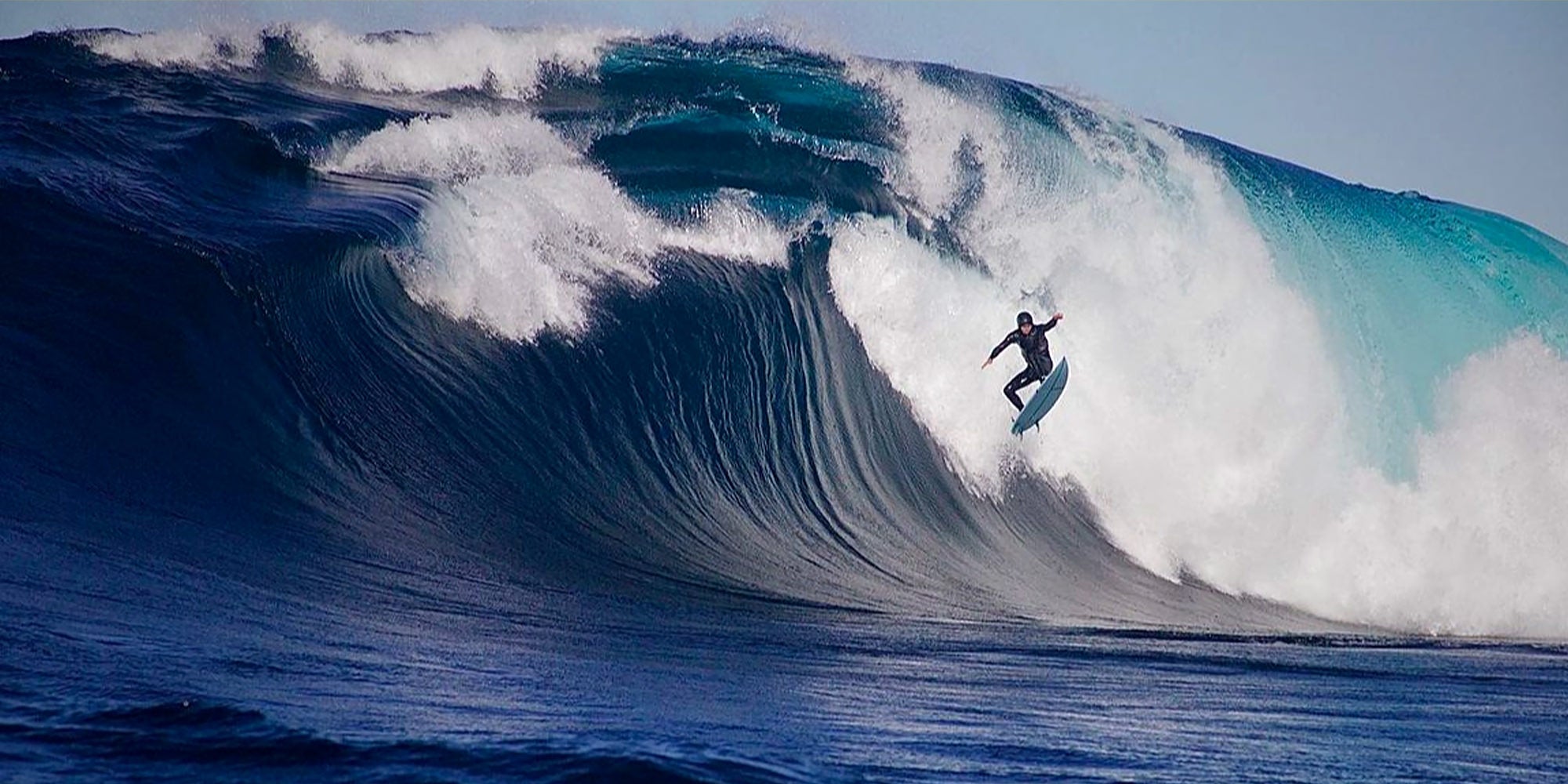 Ned Hart Air Dropping a Big Wave