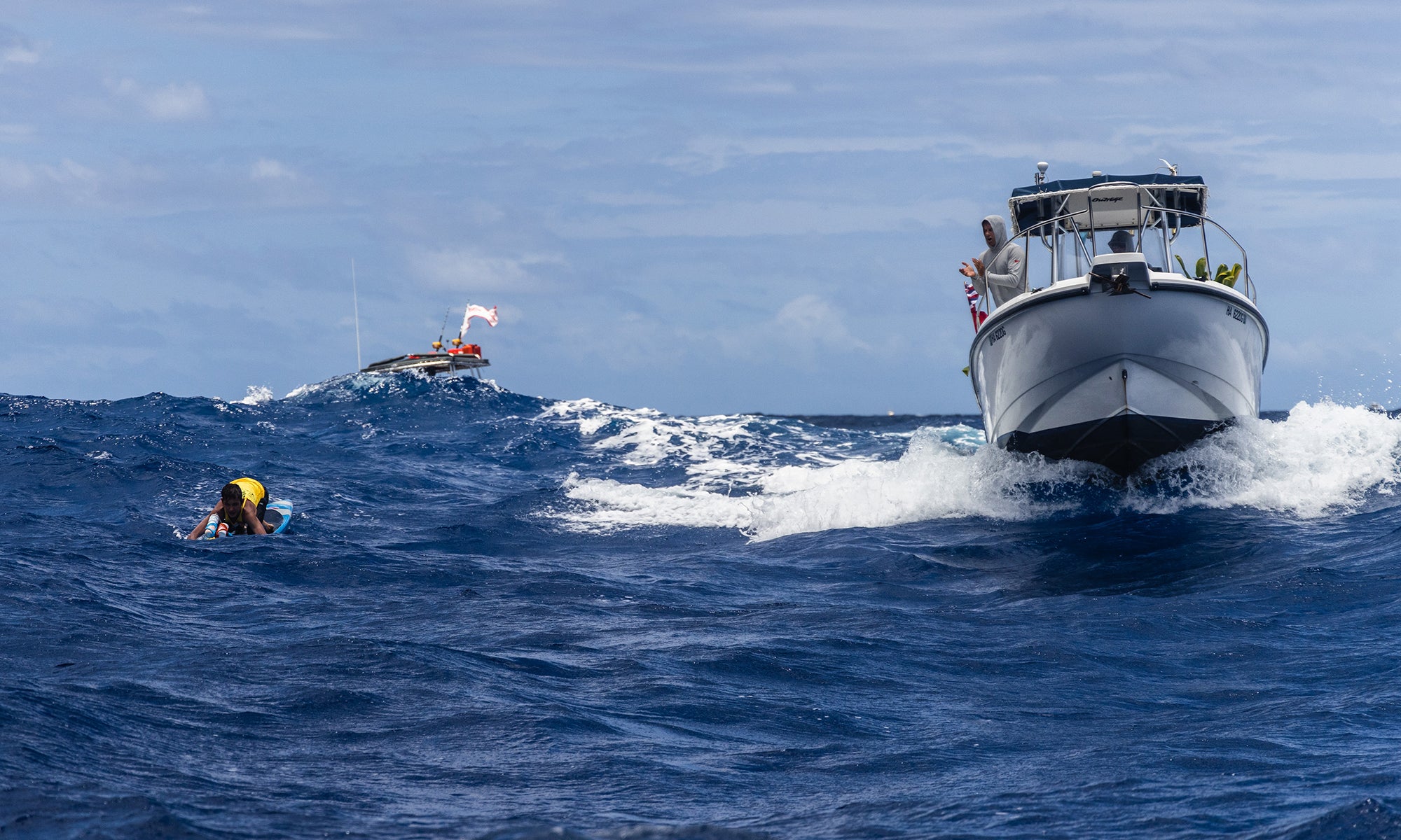 Toa Pere Paddling and Guy Pere in the Escort Boat