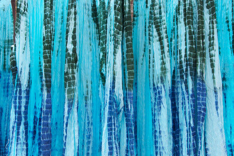 Image credit: Photo by: Jon Connell Bandhani, Tie_dye_dresses, drying in Jaipur