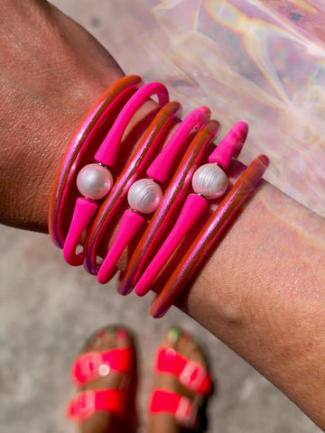 Make the hot pink Barbiecore aesthetic your own with these hot pink bracelets from WomanShopsWorld