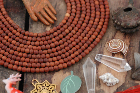 ic:Meerkat Brown Olive Wood Beads