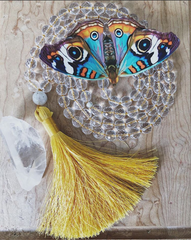 Yellow tassel mala by the crystalline moon. Bohemian yoga jewelry for meditation.