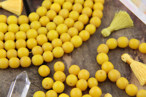 ic:Ceylon Yellow Round Resin Beads