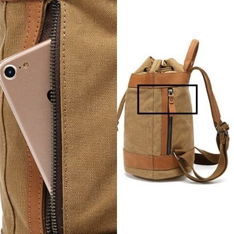 canvas backpack with side zip pocket
