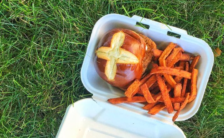 bartlebys sandwich and fries in box on grass