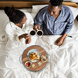 Breakfast in bed served on wooden serving trays for Valentine's Day