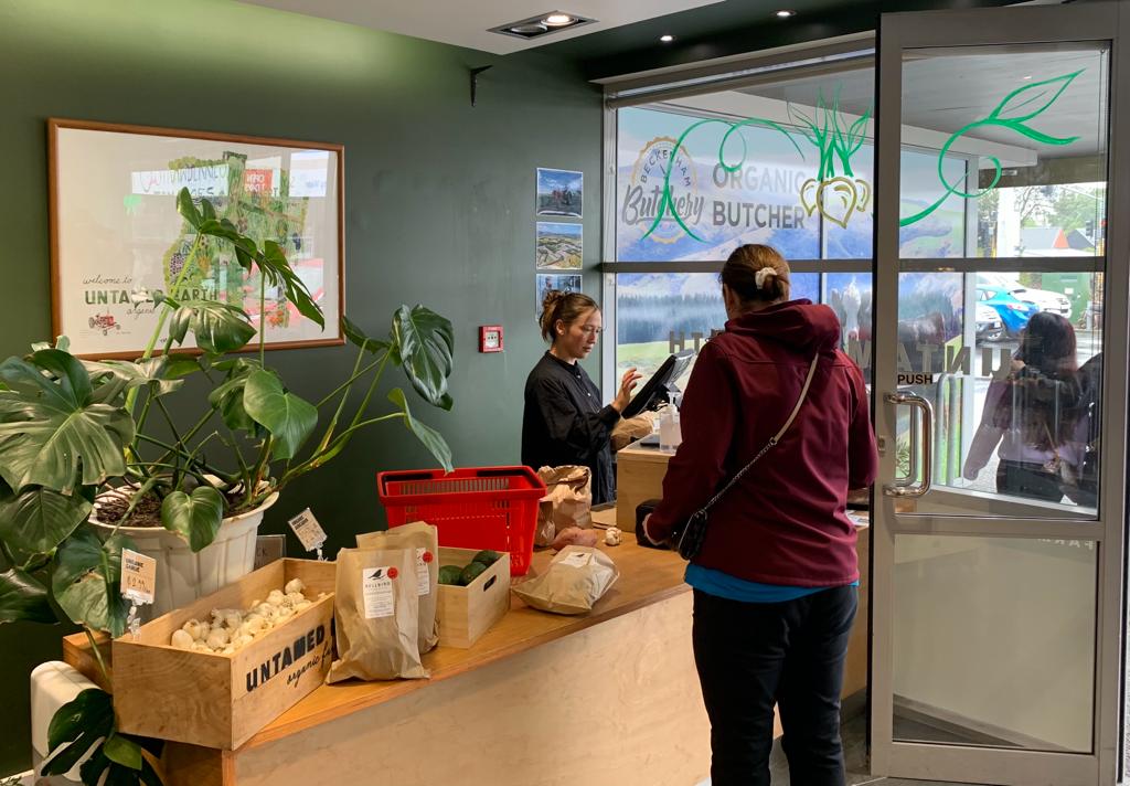 Customers in the Untamed Earth farm shop