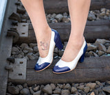 navy and white spectator pumps