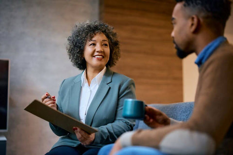 female coach conferring with a client