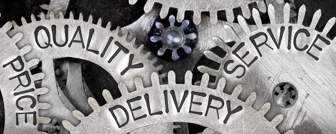 Gears with the words quality, delivery, service and price engraved in them