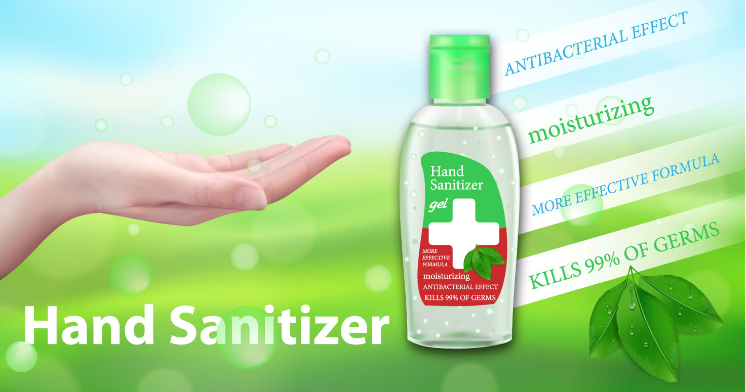Hand with bottle of hand sanitizer against grass and blue sky