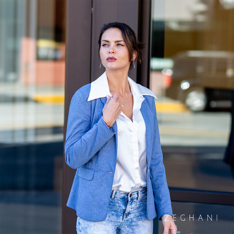 Woman walking downtown with gold and silver jewelry