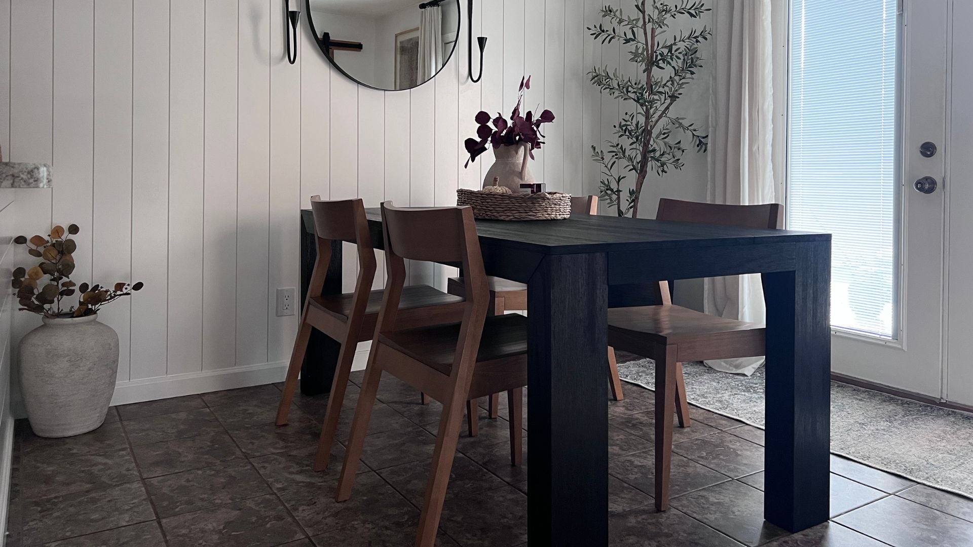 Solid wood black kitchen table with solid wood dining chairs in pecan