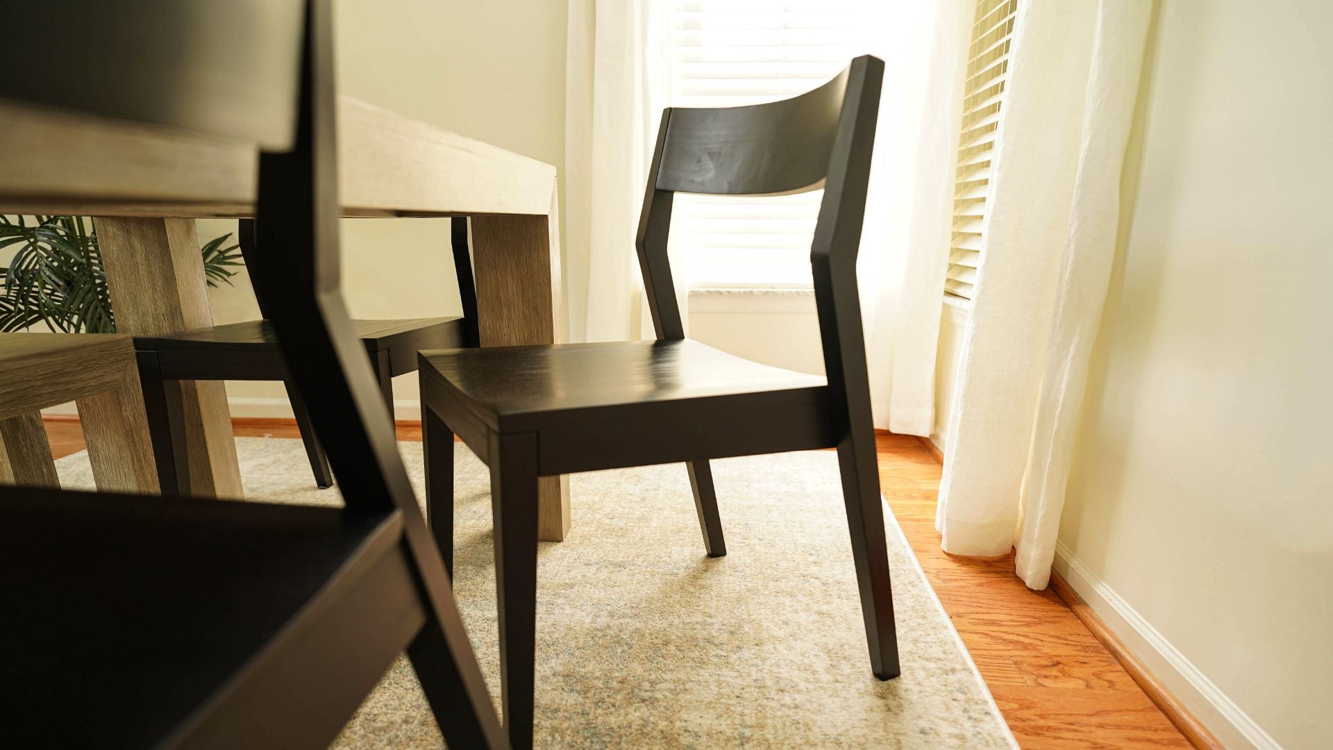 black wooden dining chair