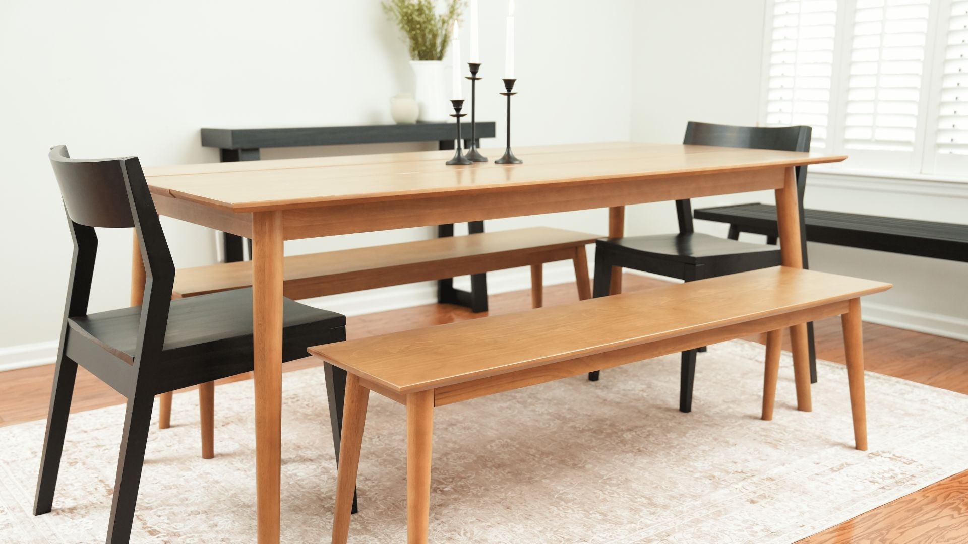 mcm dining room table with black chairs