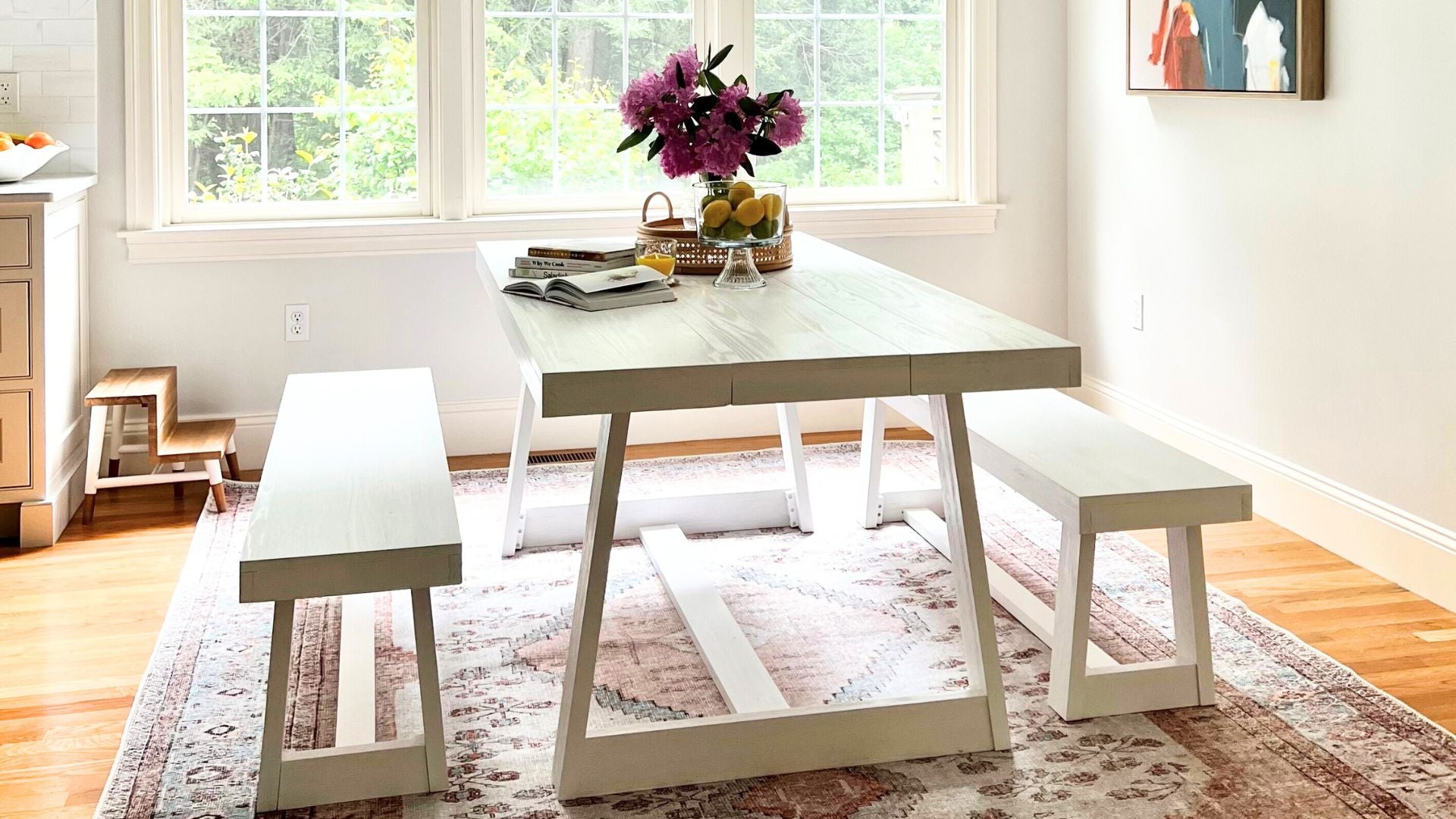 white solid wood dining table set with dining benches