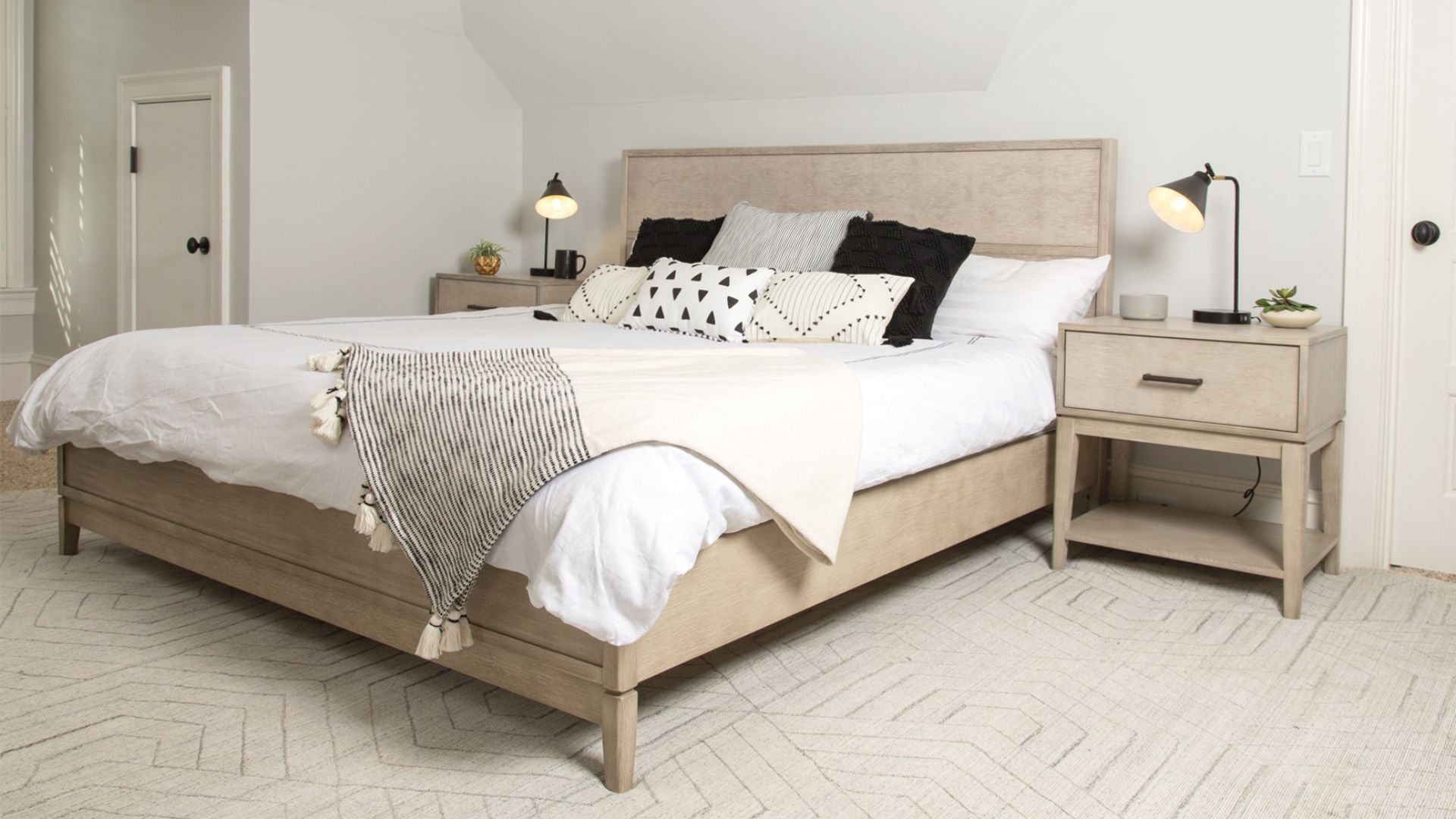 natural wood bed frame and modern nightstands