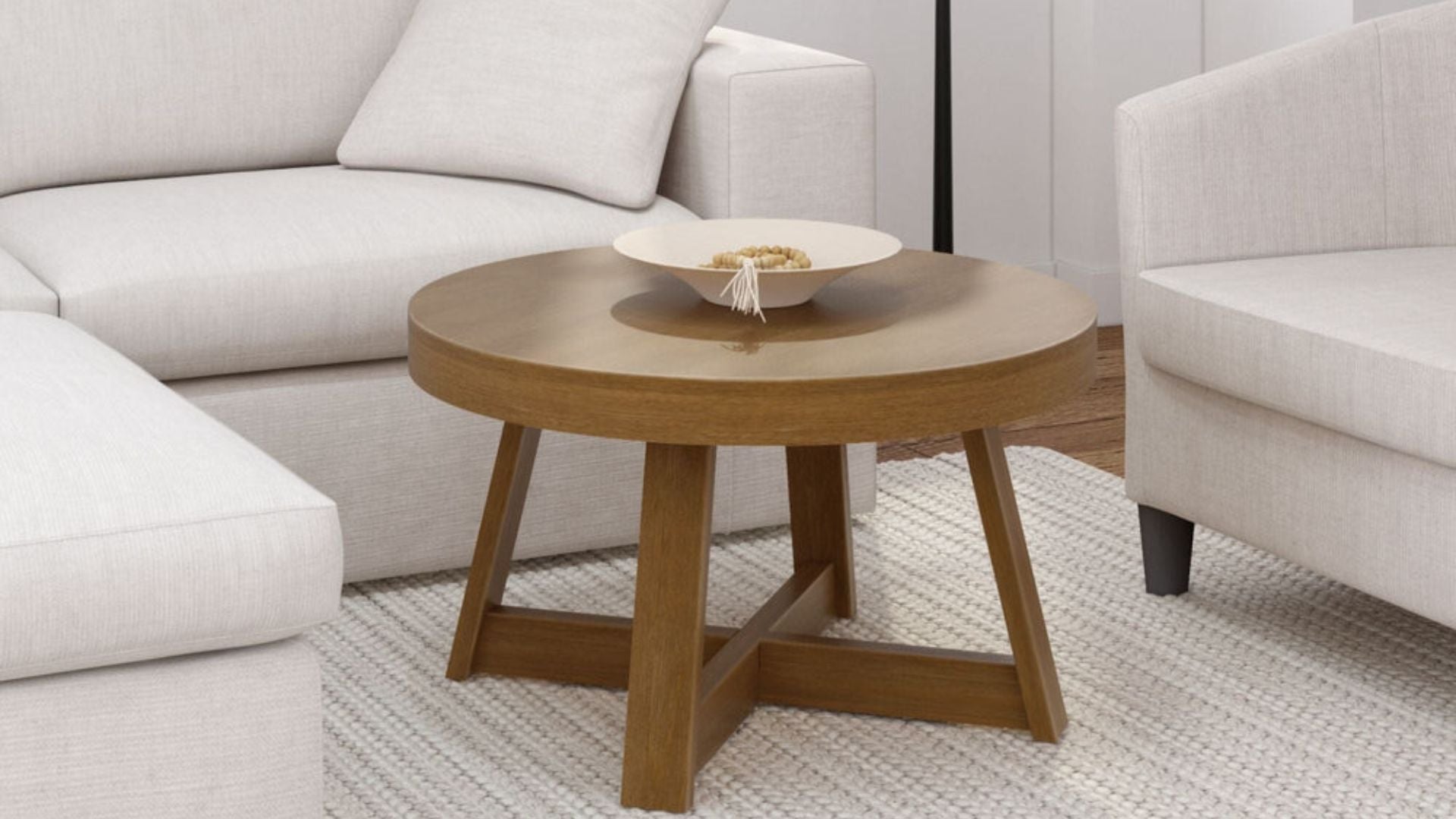 Classic round wood coffee table in pecan wirebrush