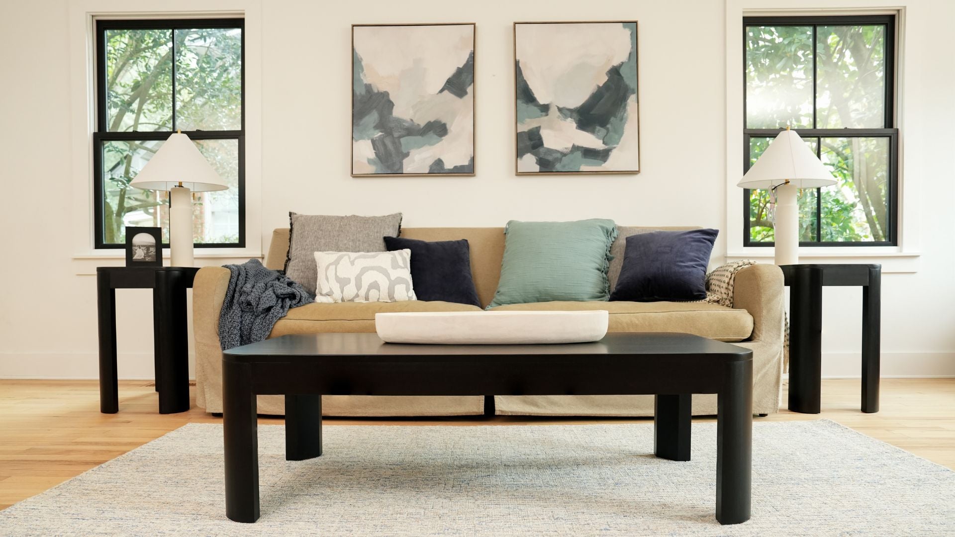 Black coffee table and black end tables for living room