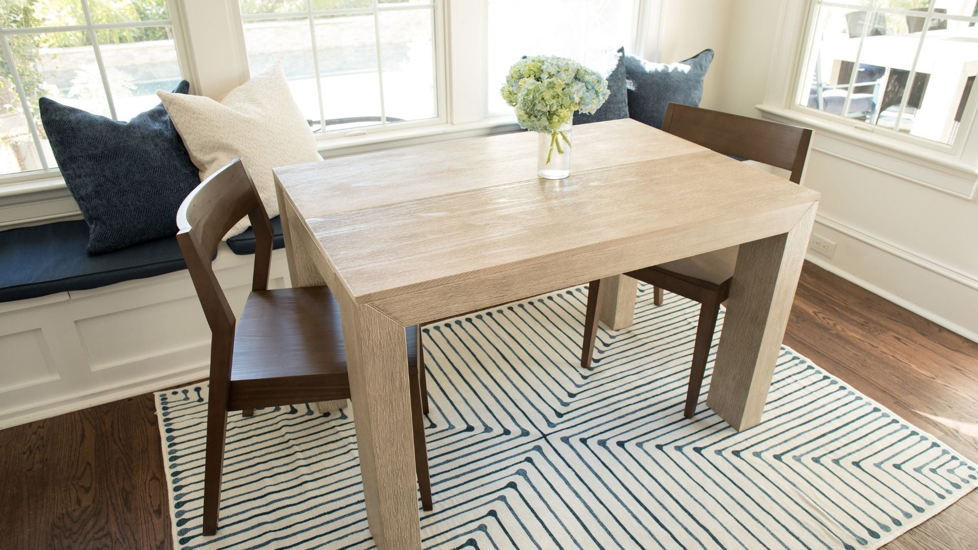 Solid wood kitchen table and walnut dining chairs in breakfast noo