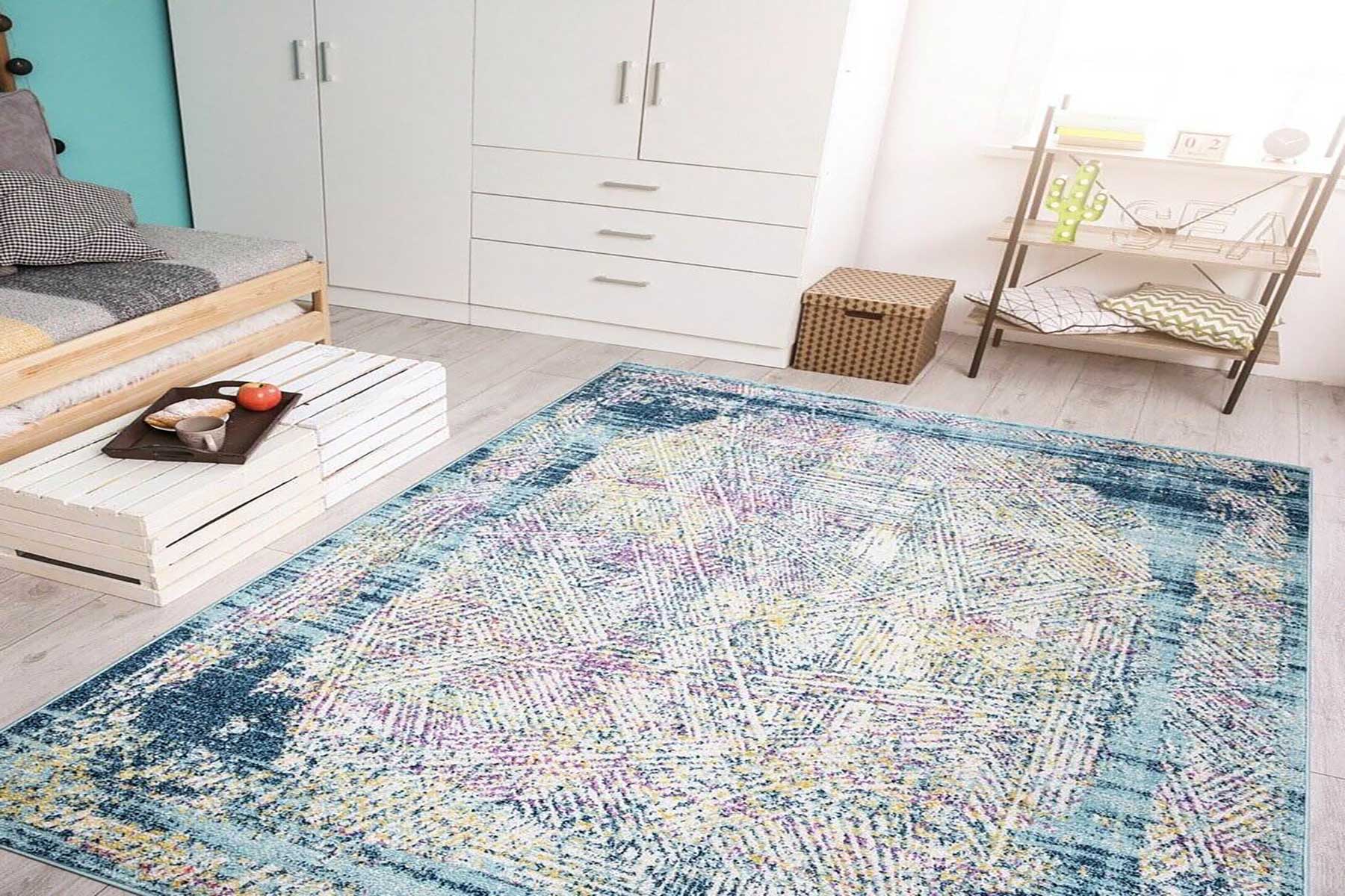 benefits of layering rugs in bedroom www.homelooks.com