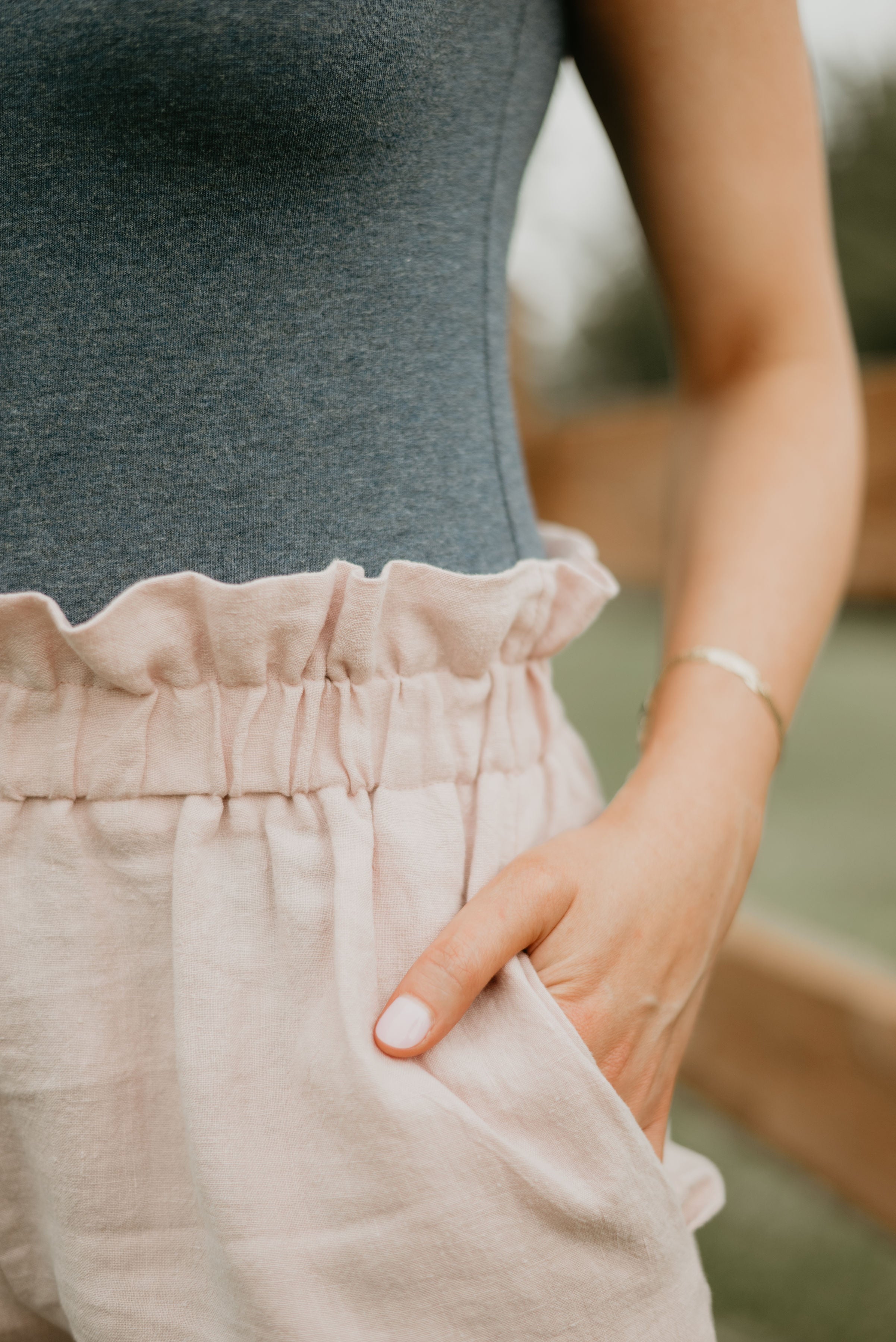 closeup of blush paperbag shorts