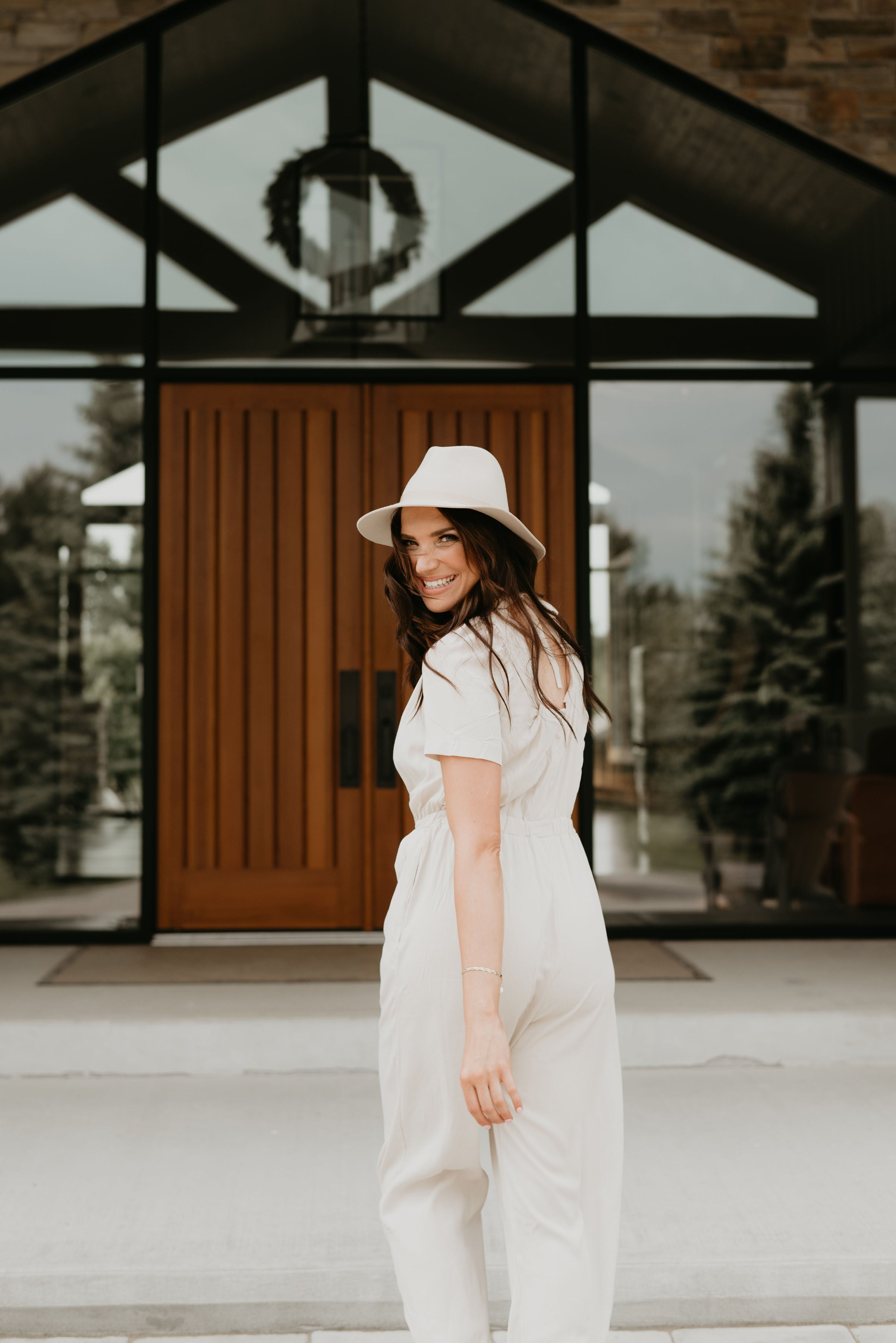 white jumpsuit and hat