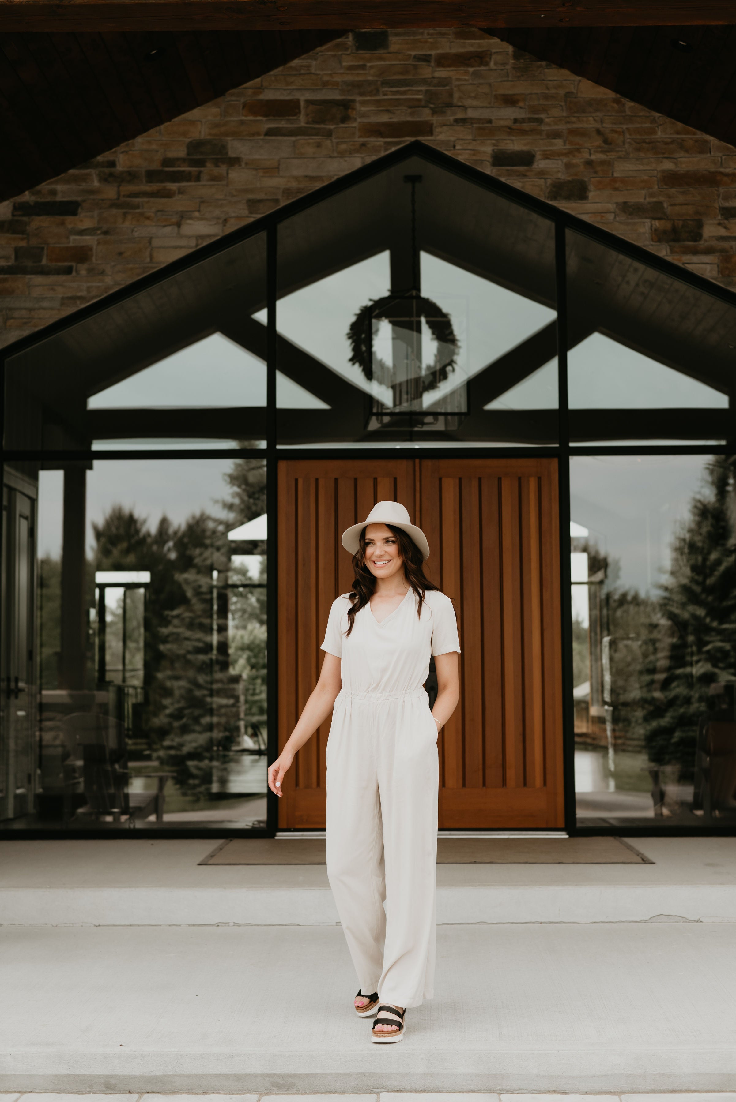 white jumpsuit and hat