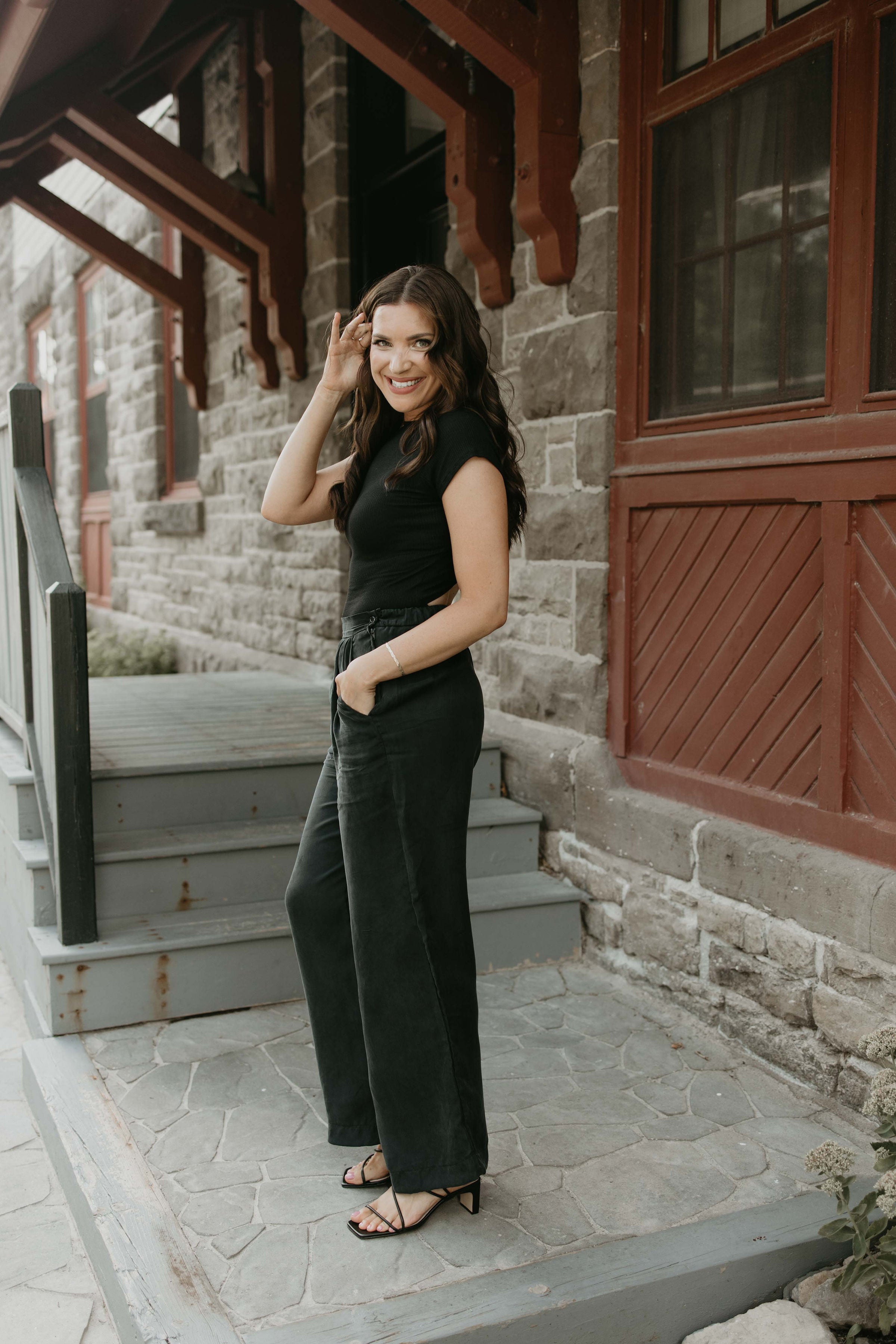 black trousers and black top