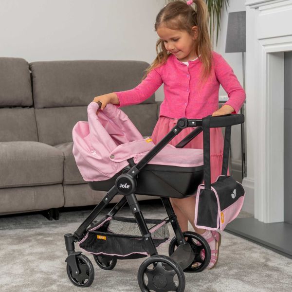 Child with dolls pram