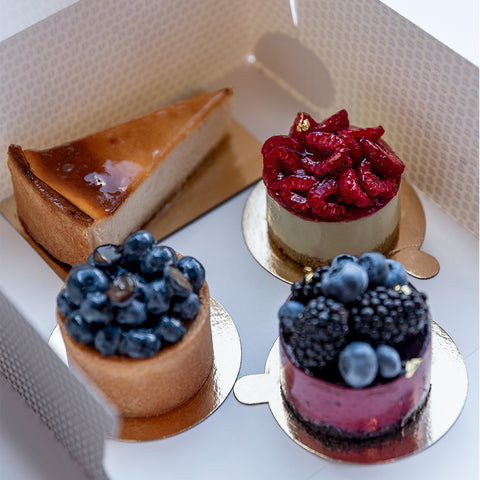 A set of four cheesecakes