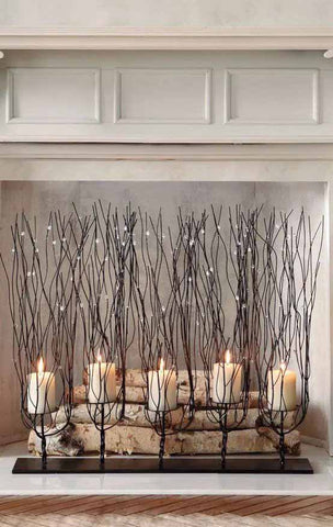 A modern candlestick with a branched metal design around candles - ZenQ Designs