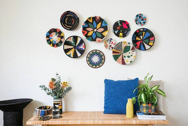 Colorful wicker baskets on the wall