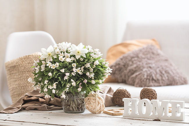 Living room with beautiful flowers in zen environment - ZenQ Designs