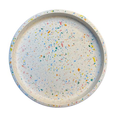 The Custard Tarts jesmonite round tray in white with jesmonite rainbow flakes