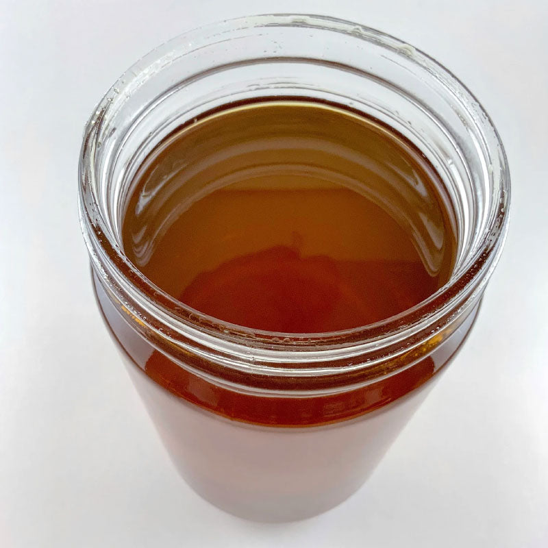 Image of CBD distillate in a jar.