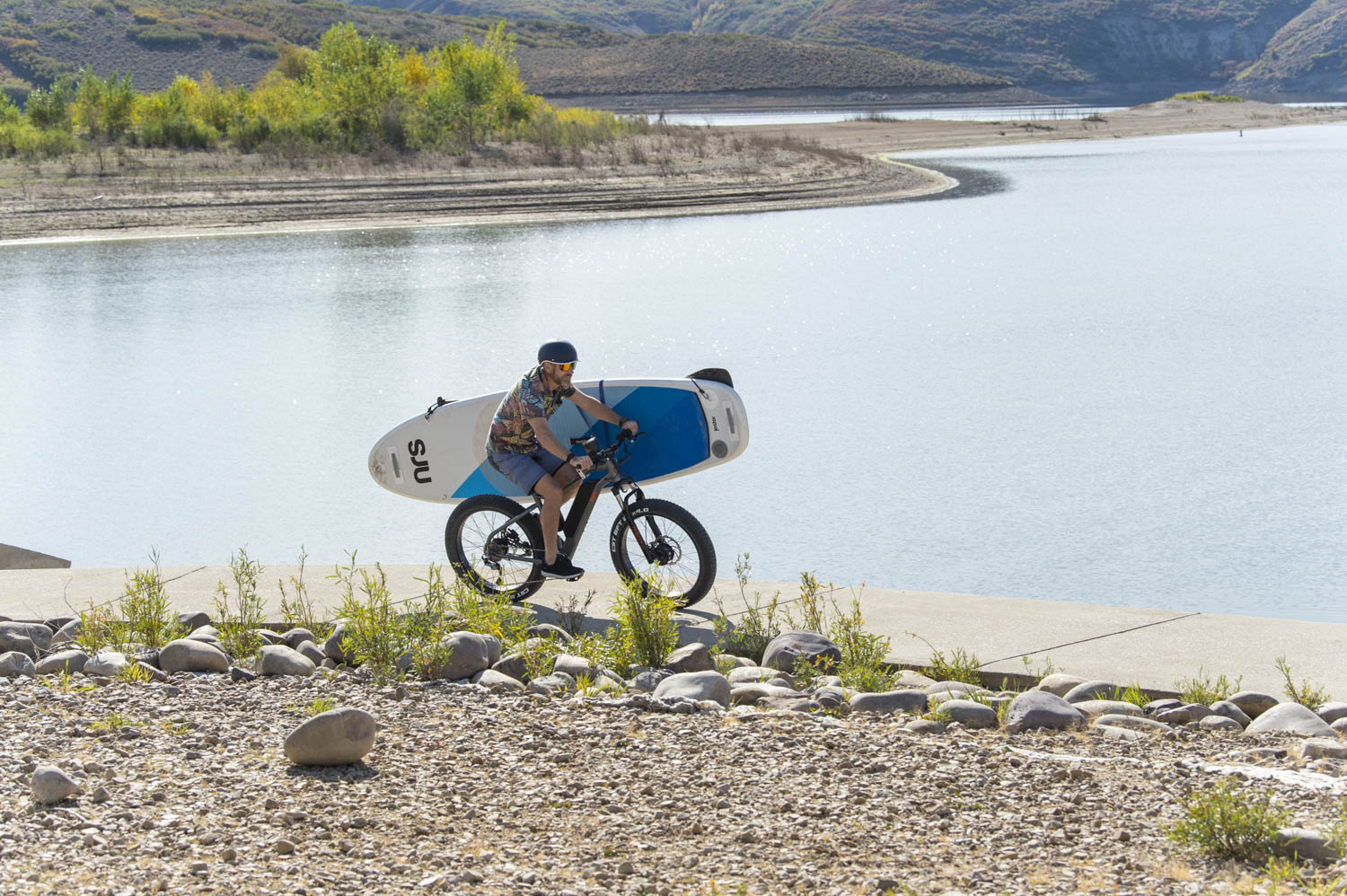 biking with SUP board in tow on an e-bike PWR dually e-bike