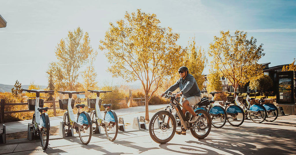 Man riding bicycle in downtown area