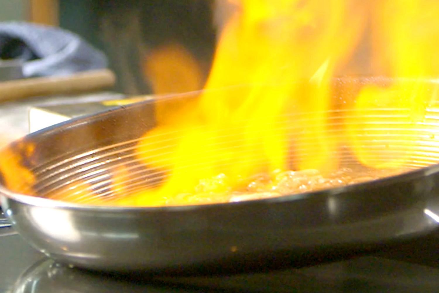 Brandy being flamed in a non-stick SteelShield frying pan